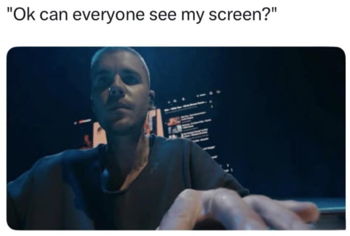 Bieberchella meme featuring a close-up of Justin Bieber leaning into the camera on stage with a focused, tech-support-style expression. The caption perfectly summarizes the "Zoom meeting" aesthetic: "Ok can everyone see my screen?"
