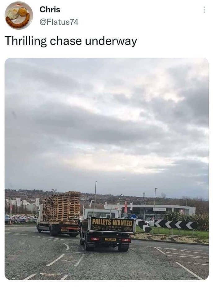 Tweet captioned "Thrilling chase" showing a truck reading "Pallets Wanted" behind a truck loaded with pallets.