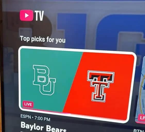 An accidentally funny sports graphic from a YouTube TV "Top Picks" menu featuring a Baylor vs. Texas Tech game, where the Baylor "BU" logo and Texas Tech "TT" logo are perfectly aligned to spell out "BUTT."