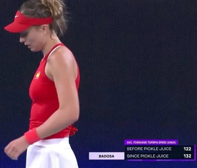 A tennis broadcast graphic for player Paula Badosa. It tracks her "AVG. FOREHAND TOPSPIN SPEED (KM/H)" with two categories: "BEFORE PICKLE JUICE (122)" and "SINCE PICKLE JUICE (132)," making the brine sound like a legal steroid.