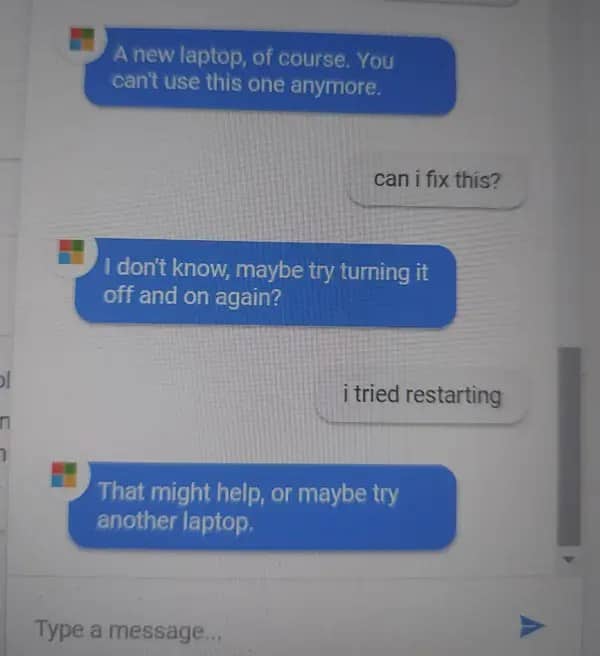 Microsoft support chatbot recommending user buy a new laptop and try restarting as solutions.