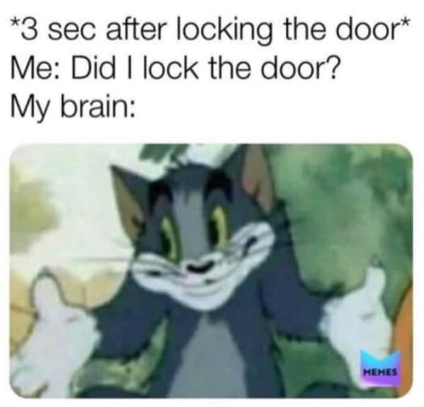 A relatable anxiety meme featuring Tom from Tom & Jerry looking at his hands with a vacant, bewildered stare. The text describes the immediate short-term memory loss that happens three seconds after locking a door: "Did I lock the door? My brain:"