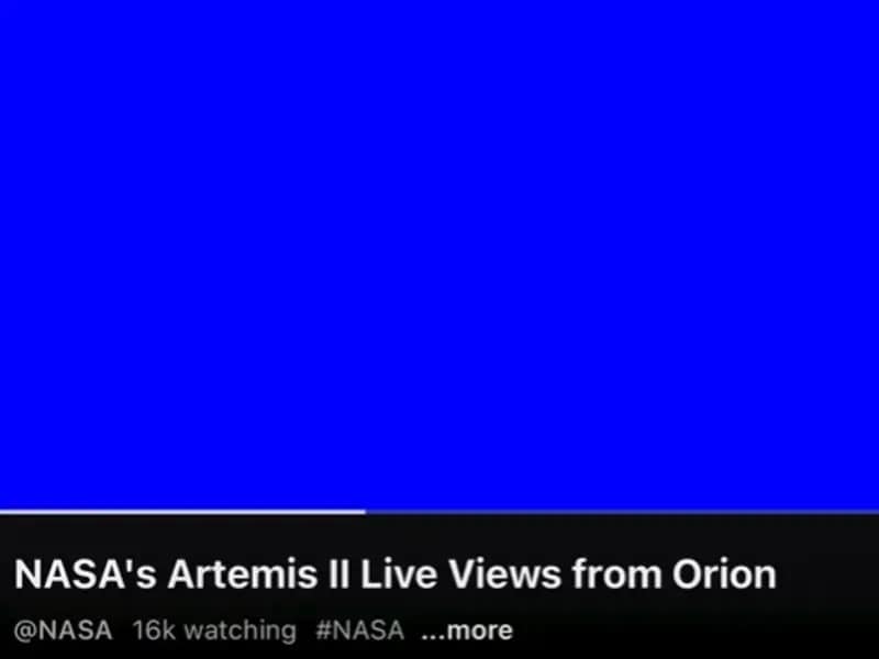 A minimalist artemis 2 meme capturing the frustration of technical difficulties, showing a solid blue screen of death style graphic over a YouTube stream titled "NASA's Artemis II Live Views from Orion."