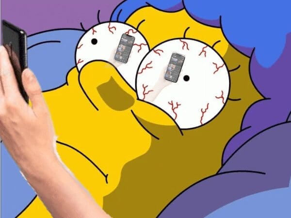 Homer Simpson can't sleep meme showing bloodshot eyes with phone screens reflected in pupils
