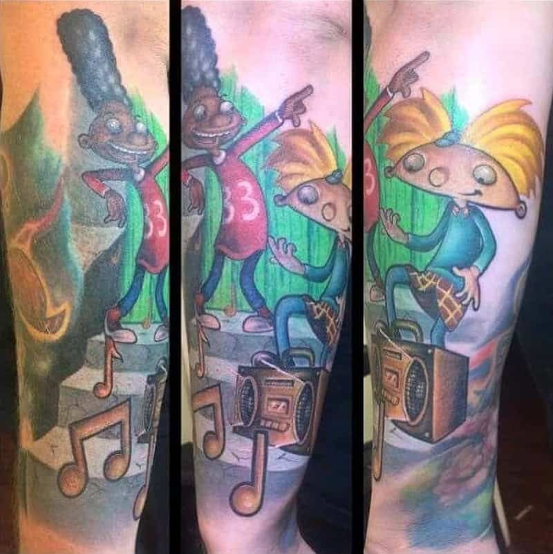 Hey Arnold cartoon tattoo sleeve featuring Arnold Gerald and boombox with musical notes