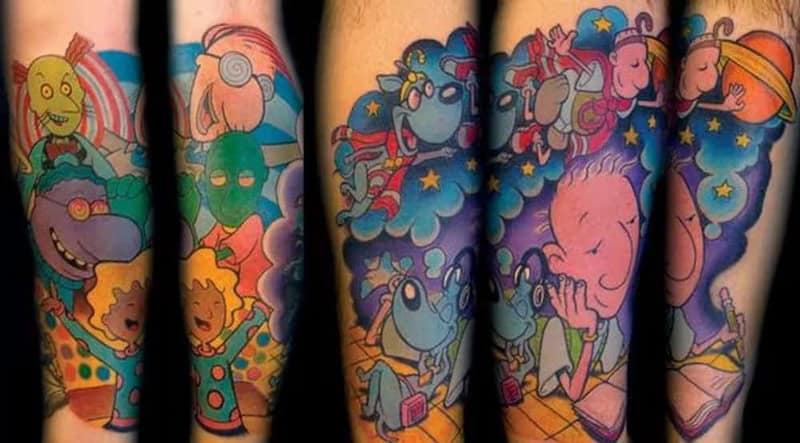 Full color Nickelodeon Rugrats cartoon character sleeve tattoo with stars and dreamy cloud background