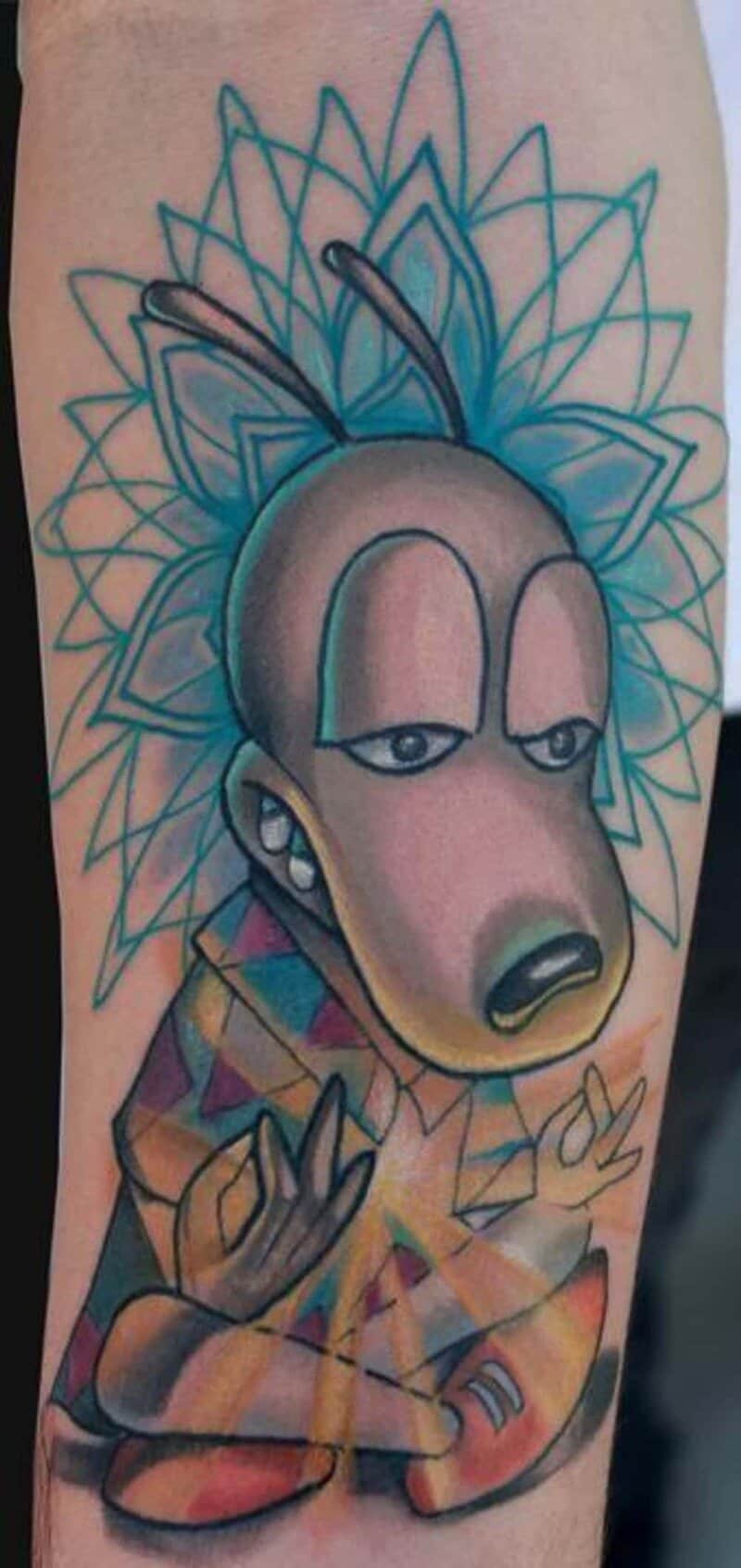 Rocko from Rocko's Modern Life cartoon tattoo with intricate mandala geometric design on forearm