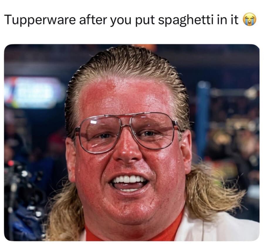 A legendary classic meme featuring pro-wrestling legend Bobby "The Brain" Heenan with an unnervingly bright red face and slicked-back blonde hair. The caption compares his glowing skin tone to "Tupperware after you put spaghetti in it."