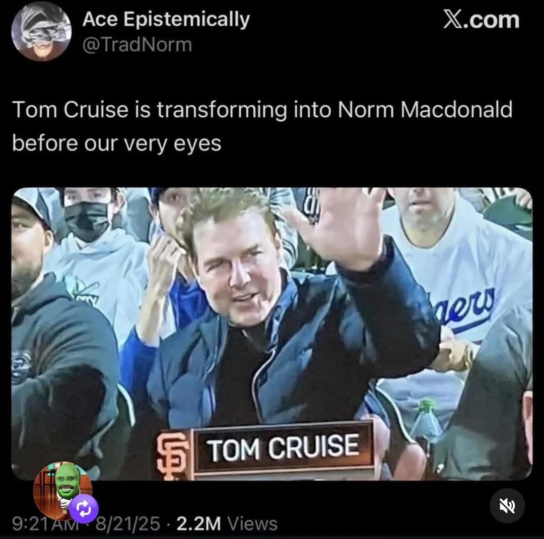 A viral classic meme tweet comparing a puffy-faced Tom Cruise at a baseball game to the late comedian Norm Macdonald. Cruise is seen waving in the stands with a slightly swollen, unrecognizable appearance, sparking jokes about him "transforming" into the SNL legend.