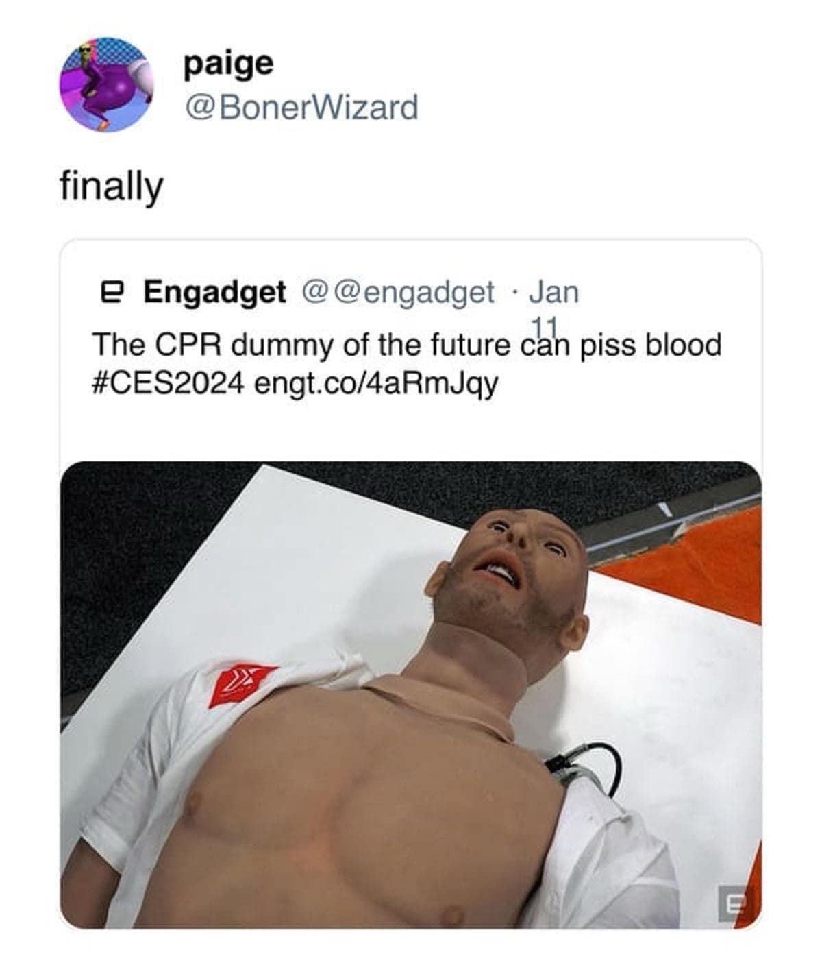 A hilarious classic meme screenshot of a tech news report from Engadget stating, "The CPR dummy of the future can piss blood," paired with a user’s deadpan reaction: "finally." The dummy itself looks hauntingly realistic with a vacant, upward stare.