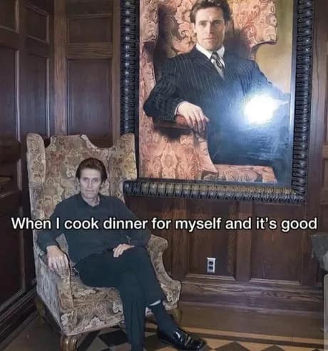 A classic meme featuring Willem Dafoe sitting regally in a high-backed armchair, positioned directly beneath a massive, identical painted portrait of himself in a sharp pinstripe suit. The text overlay reads: "When I cook dinner for myself and it's good," capturing that specific flavor of unearned self-grandeur.