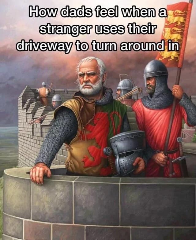 classic meme featuring a detailed painting of gray-bearded medieval knights in chainmail standing guard on a castle battlement. The text recontextualizes their stern vigil: "How dads feel when a stranger uses their driveway to turn around in."