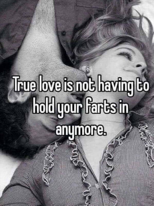A "Whisper" style classic meme with a grainy, romantic black-and-white photo of a man kissing a woman’s neck. The large, white text overlay subverts the romantic mood with a blunt relationship milestone: "True love is not having to hold your farts in anymore."