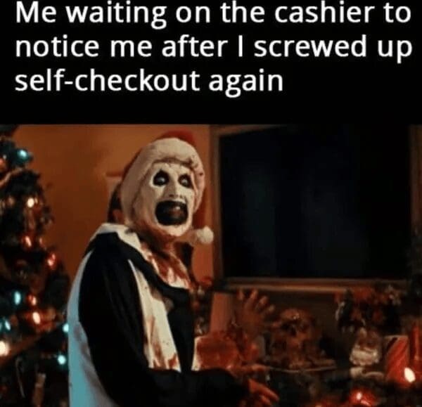 A high-anxiety best memes post featuring Art the Clown in a Santa hat from the horror movie Terrifier. The clown is shown with a creepy, wide-mouthed grin, captioned: "Me waiting on the cashier to notice me after I screwed up self-checkout again."