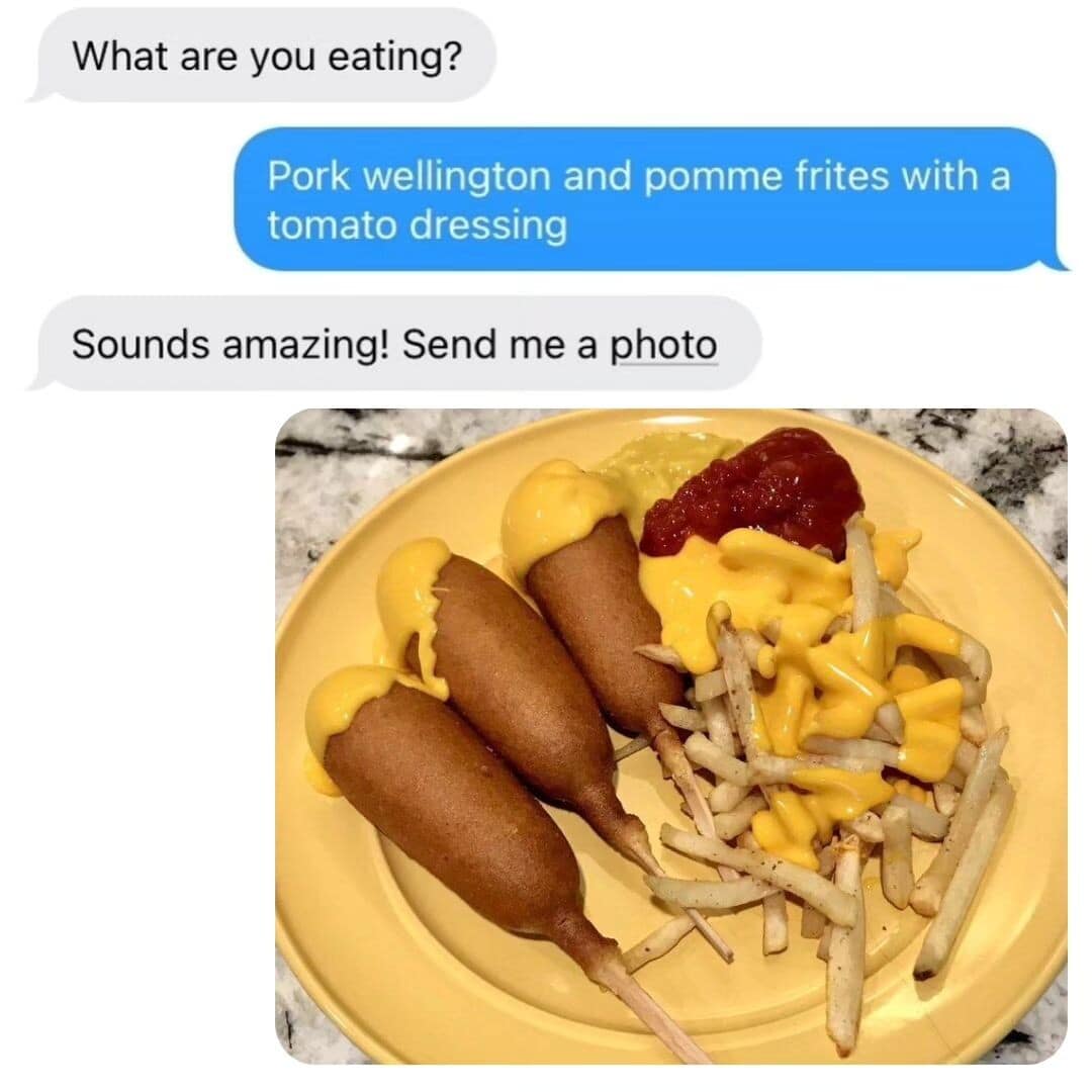 A "fancy description vs. reality" classic meme. A text bubble describes a meal as "Pork wellington and pomme frites with a tomato dressing," but the actual photo shows three corn dogs and a pile of fries doused in yellow cheese sauce and red ketchup.