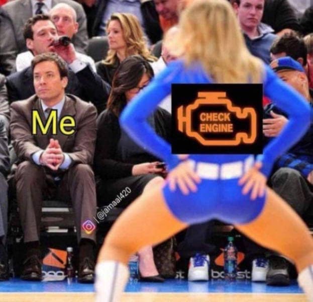 A "distracted boyfriend" style classic meme featuring Jimmy Fallon sitting courtside at a game. In the foreground, a cheerleader is bent over; an orange "Check Engine" light icon is edited over her backside, while Fallon is labeled "Me," looking on with stoic intensity.