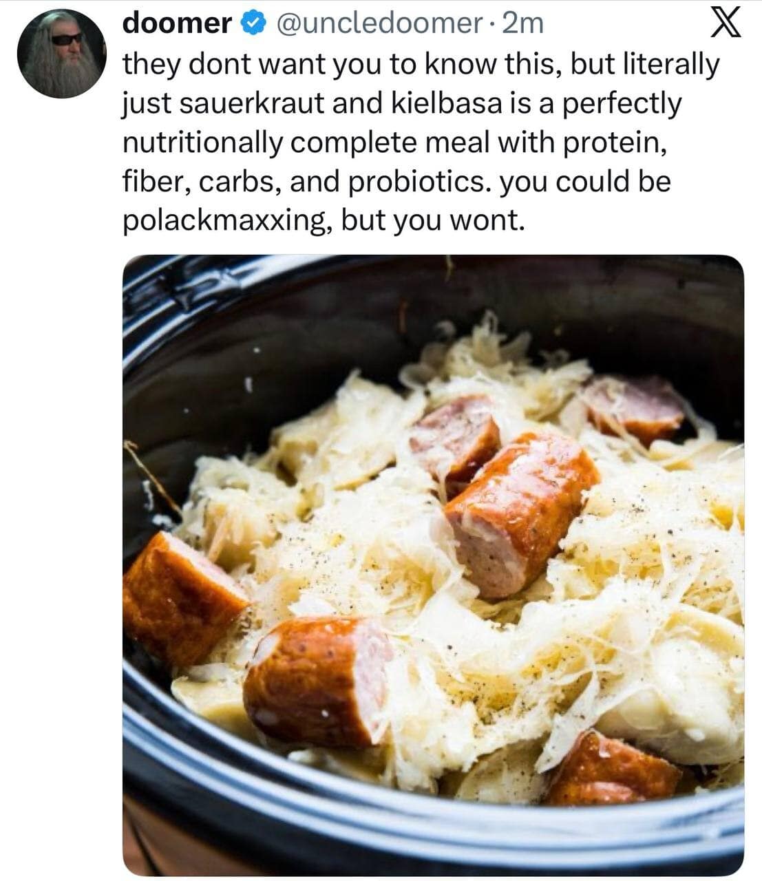A culinary post from @uncledoomer presents a crockpot full of food as a classic meme for nutritional efficiency. The image shows sliced kielbasa and sauerkraut, described as polackmaxxing and a nutritionally complete meal.