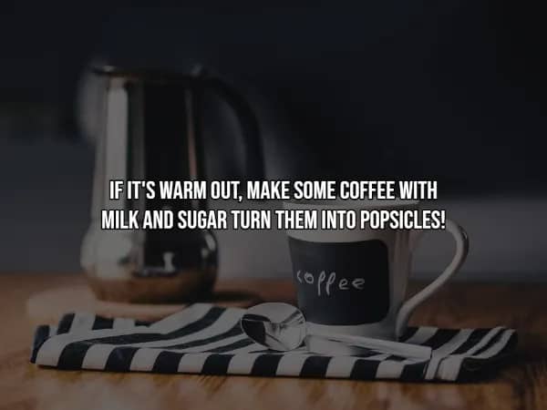 Coffee mug labeled "coffee" on striped towel with kettle, suggesting summertime coffee popsicle hacks.