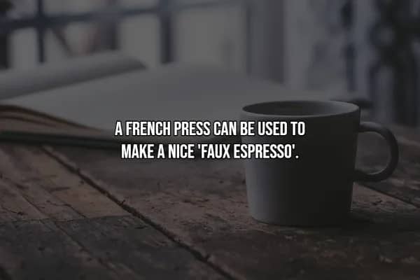 Minimalist white mug on rustic wooden surface with notebook background, illustrating French press espresso hack.