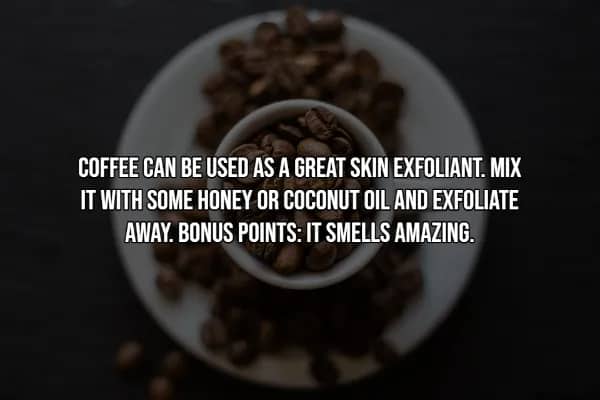 Small white bowl of coffee beans on plate against dark background, highlighting coffee skincare exfoliant hack.