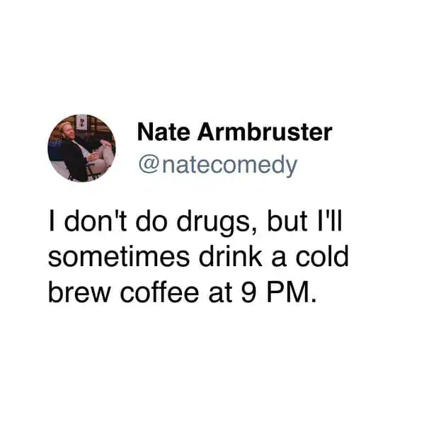 relatable coffee meme tweet from comedian Nate Armbruster. He jokes about his wild side, stating: "I don't do drugs, but I'll sometimes drink a cold brew coffee at 9 PM," implying the chaotic energy and inevitable insomnia that follows.