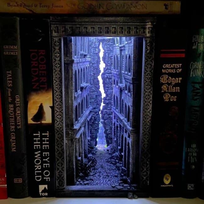 Ancient temple corridor cool bookends depicting a narrow stone passage leading toward a bright, mysterious glowing light between fantasy hardcovers.