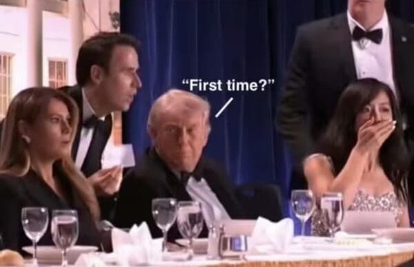A high-IQ correspondents dinner meme featuring Donald Trump sitting at a formal banquet table during a high-stress moment. He looks unamused and stoic. A white dialogue line edited over the image has him asking, "First time?"—referencing the famous "Hanging" meme about experience in chaotic situations.