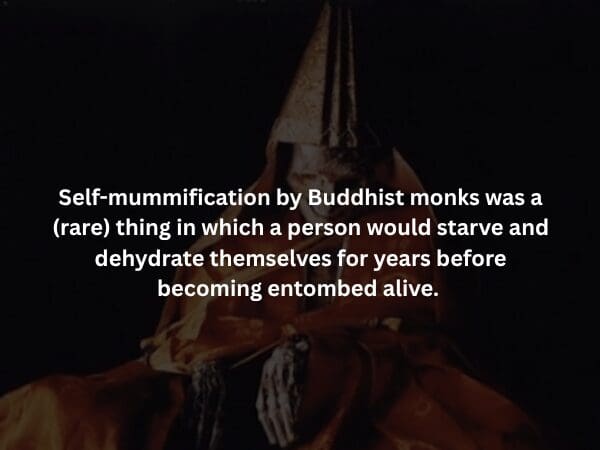 A somber, shadowed image of a monk’s mummified remains sitting in a meditative pose. The text explains the spooky fact of "Sokushinbutsu," or self-mummification, where monks would endure years of starvation and dehydration before being entombed alive.