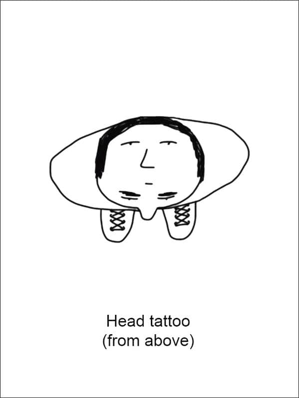 A witty funny Demetri Martin drawing titled "Head tattoo (from above)" showing a top-down perspective of a man’s head, ears, and feet, with a simple face tattooed on the very top of his scalp.