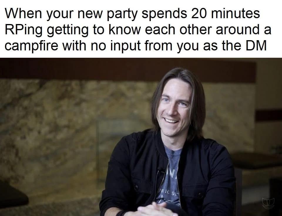 A wholesome d&d meme showing a photo of Critical Role DM Matt Mercer smiling with genuine pride. The caption reads: "When your new party spends 20 minutes RPing getting to know each other around a campfire with no input from you as the DM."