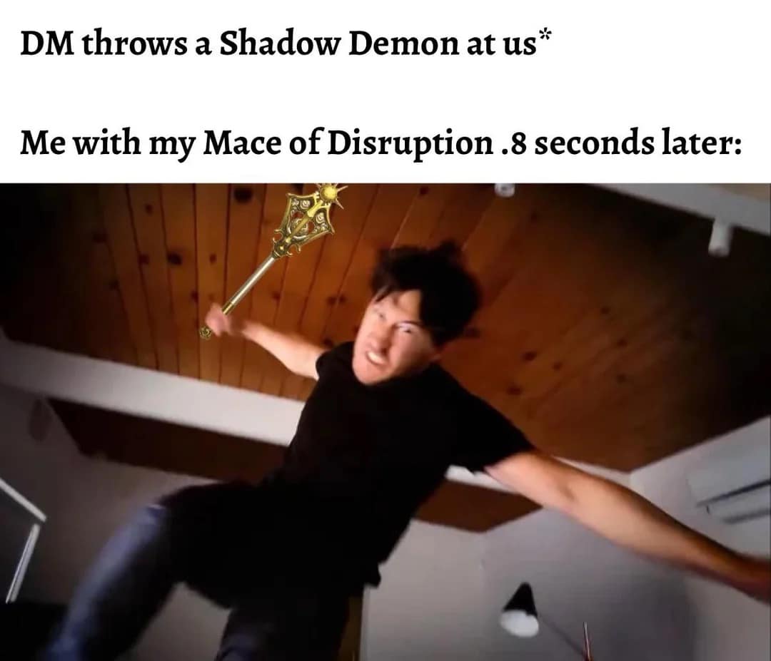 A high-intensity dnd meme featuring Markiplier lunging aggressively toward the camera. He has been edited to hold a glowing "Mace of Disruption," symbolizing a player's immediate reaction when a DM introduces a Shadow Demon.