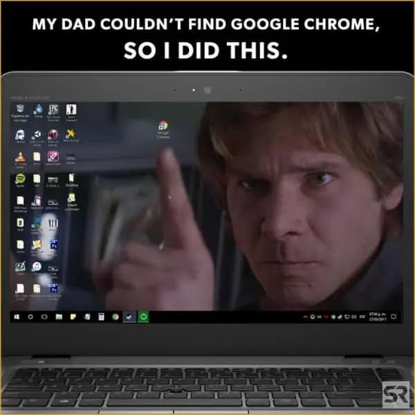 dumb meme showing a laptop screen with a cluttered desktop. The wallpaper features a close-up of a younger, very serious Harrison Ford pointing his finger directly at the only visible icon on the right side of the screen: Google Chrome. The text reads: "MY DAD COULDN'T FIND GOOGLE CHROME, SO I DID THIS."