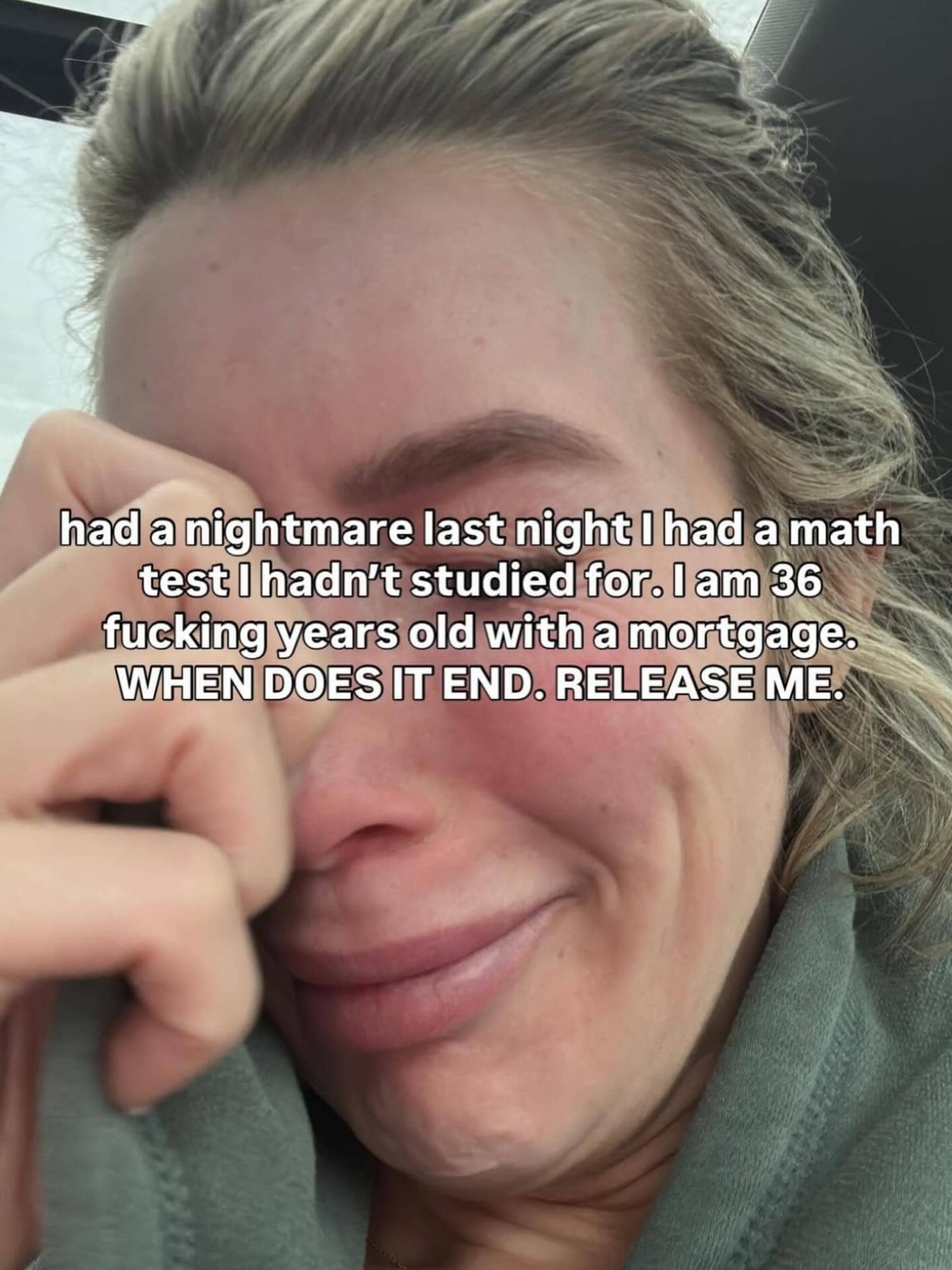 Close-up of a woman crying about having a school nightmare despite being an adult with a mortgage.