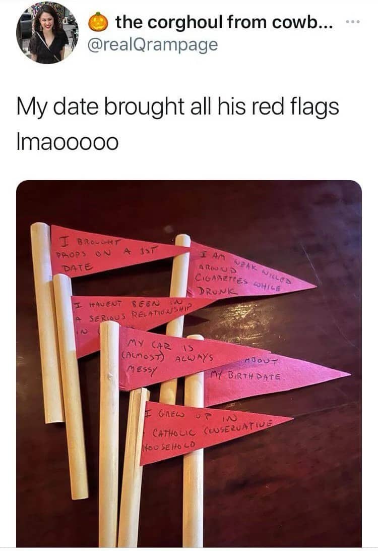A date who literally brought physical red flags with funny personal deal-breakers written on them.