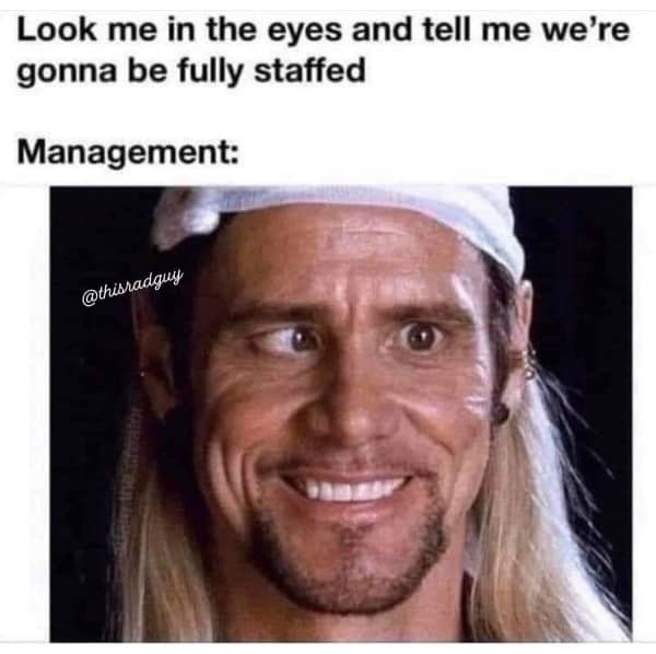 Funny memes about work stress Jim Carrey lying face when management promises being fully staffed soon.