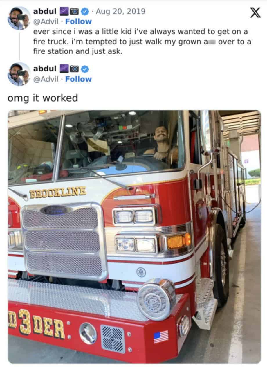 Tweet showing a man fulfilling his childhood dream by sitting inside a large fire truck.