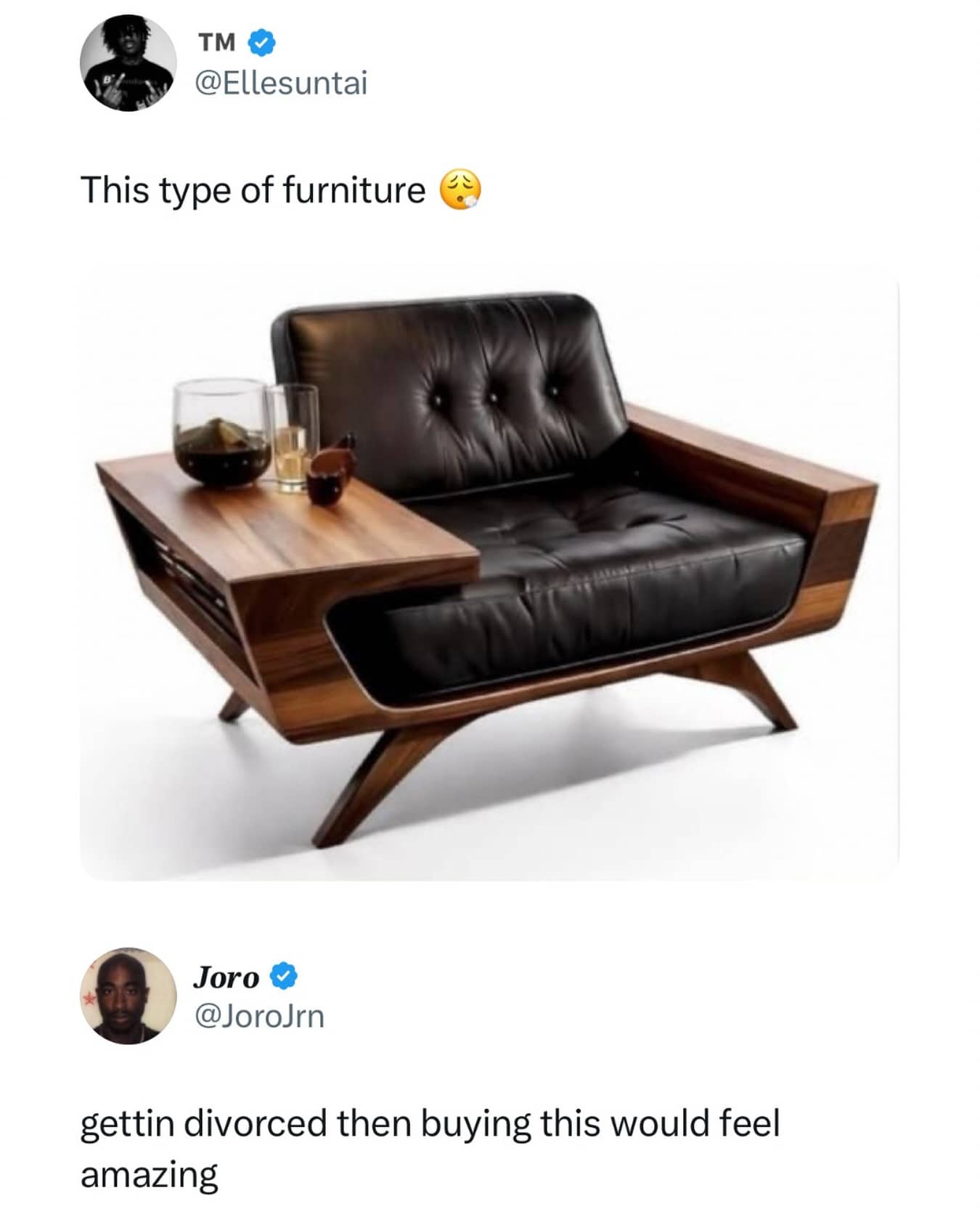 Luxury mid-century modern leather lounge chair with a built-in wooden side table and drink.