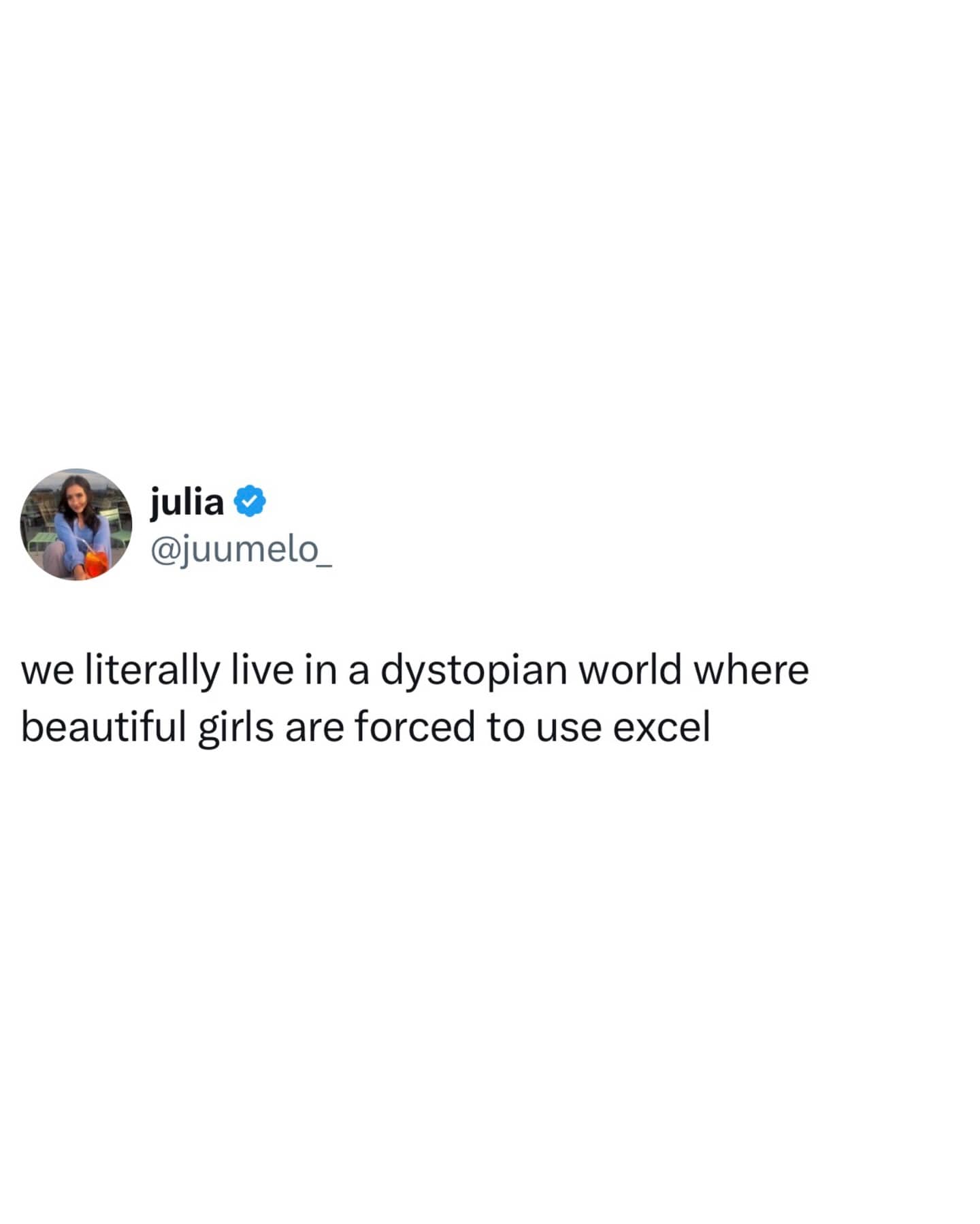 Twitter post by Julia stating we live in a dystopian world where beautiful girls use Excel.