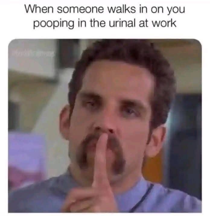 Ben Stiller as White Goodman holding a finger to his lips with caption about workplace urinals.