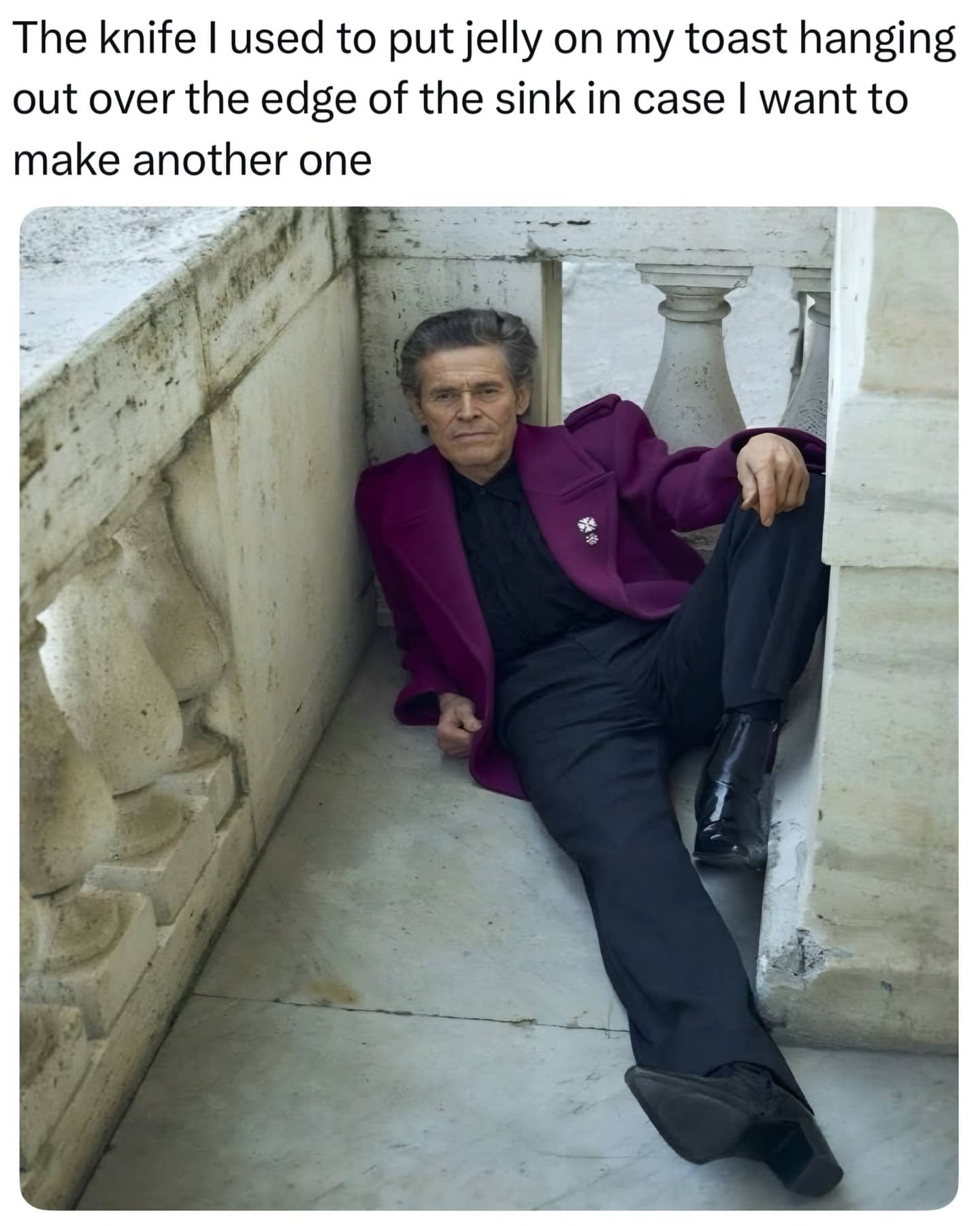Willem Dafoe lounging on a balcony representing a jelly knife waiting for a second toast.
