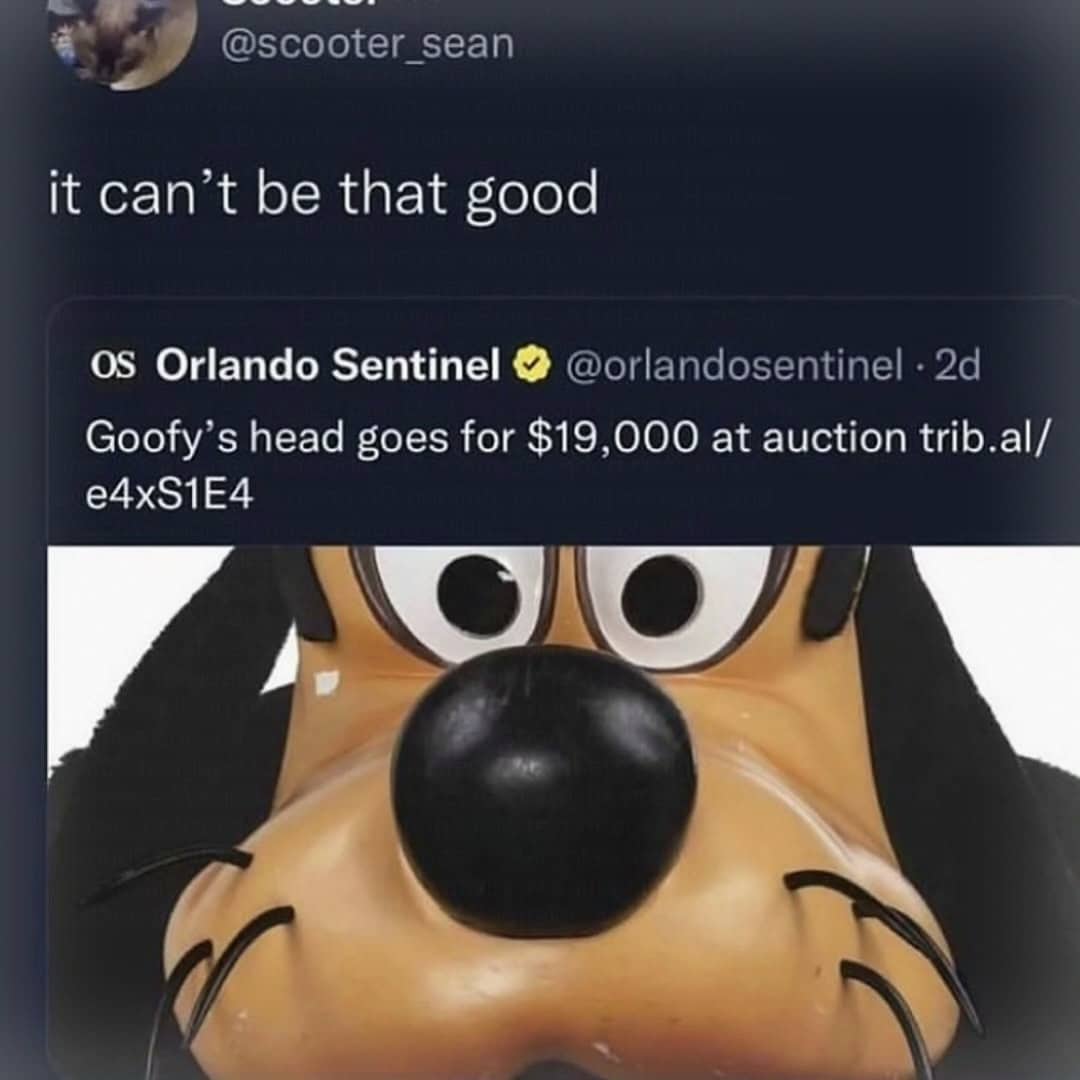 Close-up of Goofy mascot head with a tweet about it selling for nineteen thousand dollars.