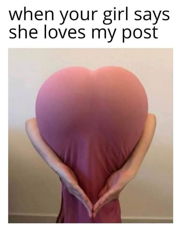 Optical illusion showing two hands holding a pink dress that resembles a heart shape.