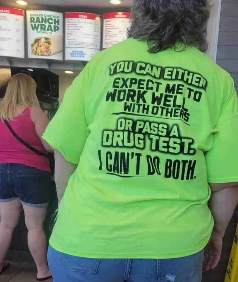 Woman wearing a neon green shirt about working well with others versus passing a drug test.