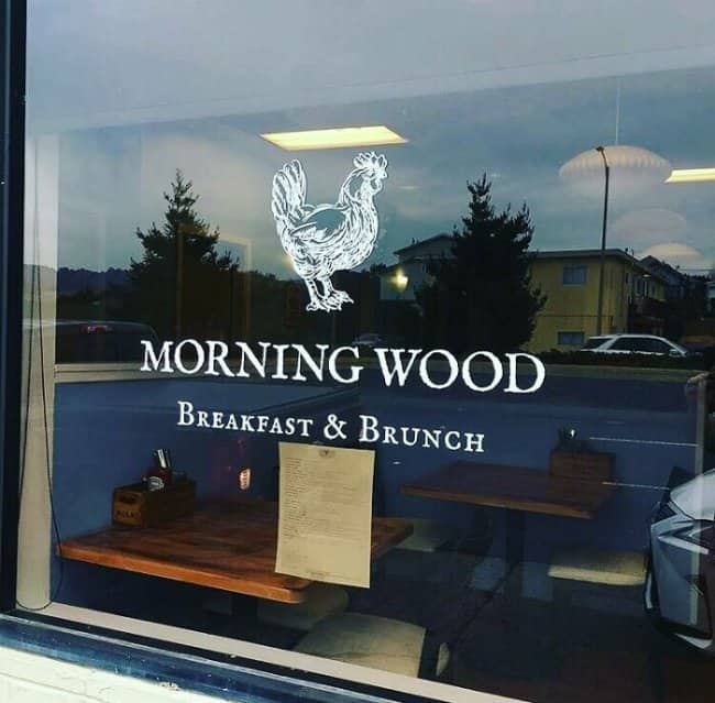 Morning Wood Breakfast & Brunch storefront window with rooster logo and cheeky double entendre name.