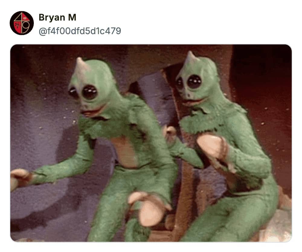 Two vintage green alien creature costumes from old science fiction TV show posted as Gen X childhood fear