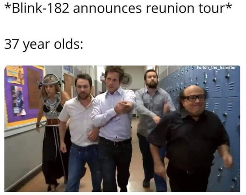 peak millennial getting old meme featuring the cast of It's Always Sunny in Philadelphia walking confidently through a high school hallway. The caption reads: "*Blink-182 announces reunion tour* 37 year olds:".