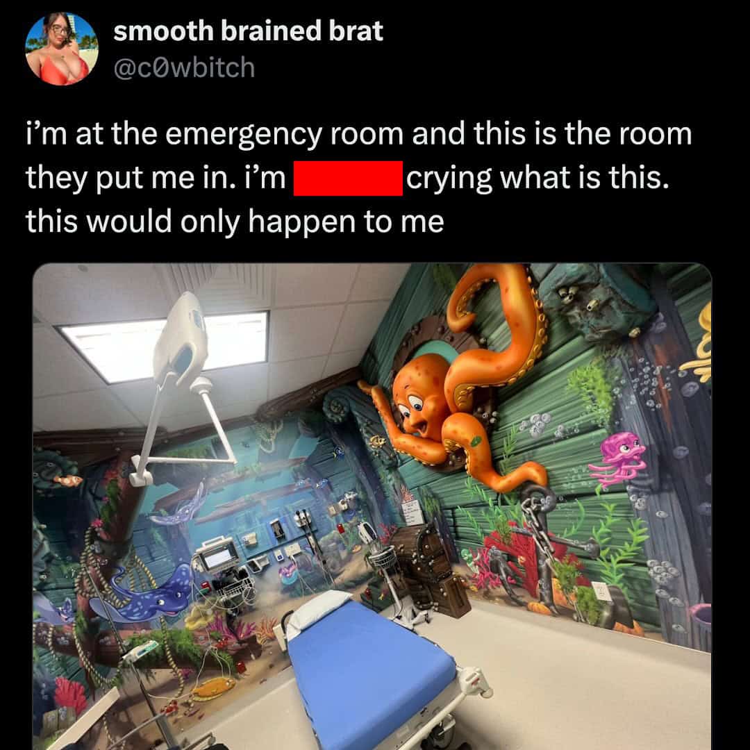 Tweet showing a hospital room decorated with colorful underwater octopus and fish murals.