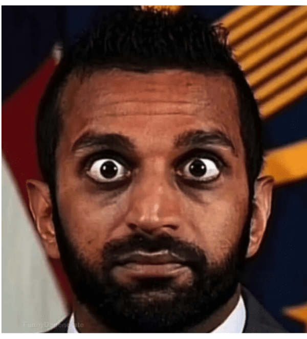 An extreme close-up Kash Patel meme focusing on the official’s face. His eyes are wide, bulging, and hyper-focused with a look of startled intensity, highlighting the "googly eye" aesthetic often used in political satire.