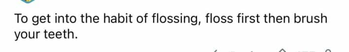 Dental tip recommending flossing before brushing to build a consistent flossing habit