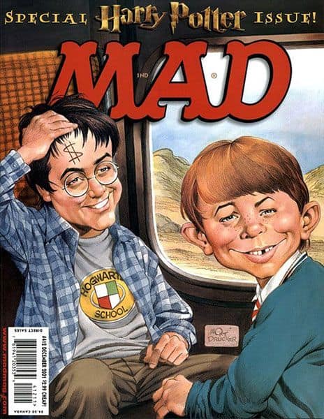 A magical vintage mad magazine cover from December 2001 featuring a "Special Harry Potter Issue." A caricatured Harry Potter lifts his hair to reveal a dollar sign ($) scar on his forehead while Alfred E. Neuman sits next to him on the Hogwarts Express train.